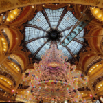 Inside Galeries Lafayette with its iconic stained-glass dome and sparkling Christmas tree
