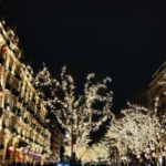 Festive Christmas lights illuminating Rue Royale in Paris at night