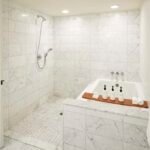 luxury ensuite bathroom with separate shower and bath tub